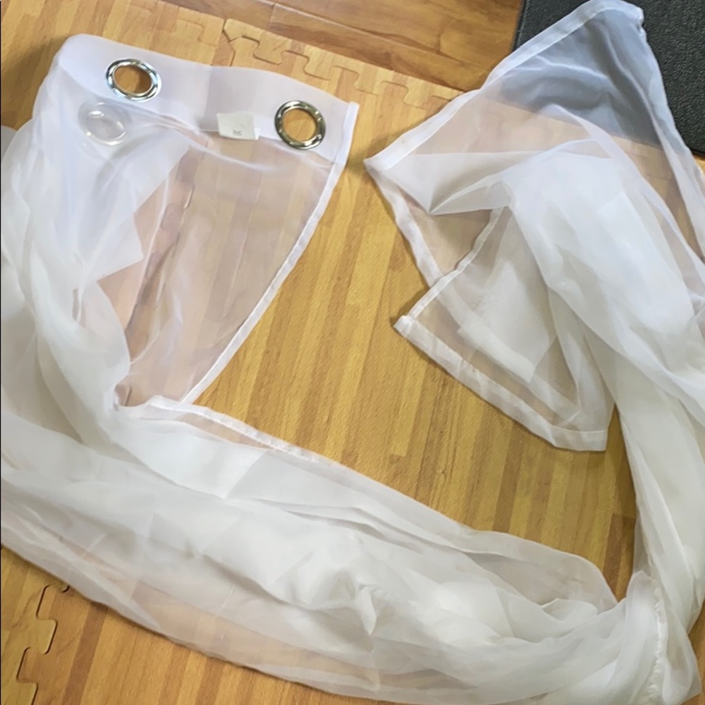 Sheer white curtain panels